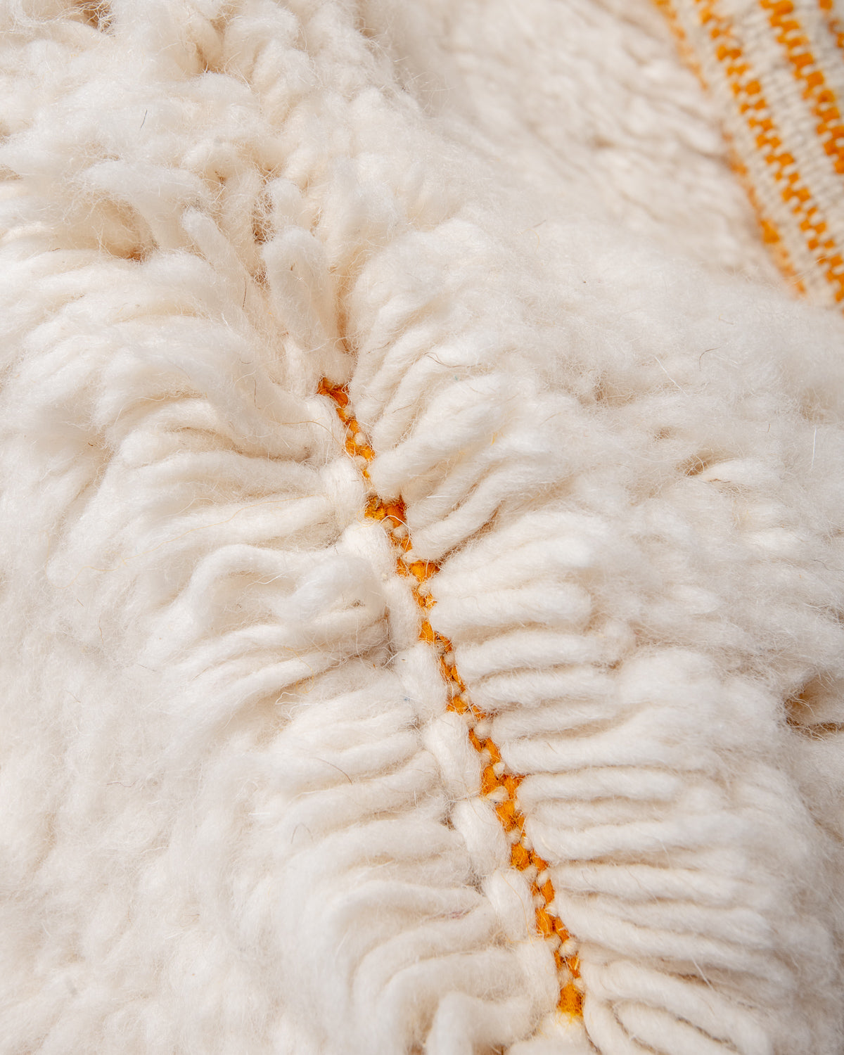 Modern, designer, handcrafted Berber rug from Morocco. Beniourain carpet with beautiful colours and patterns and fluffy wool texture.